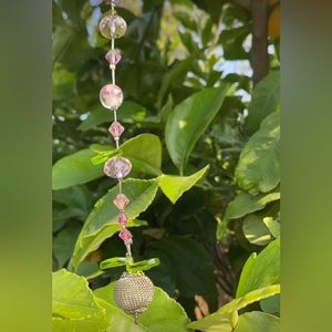 Pink crystal sun catcher with various crystal, glass and metal beads/accents